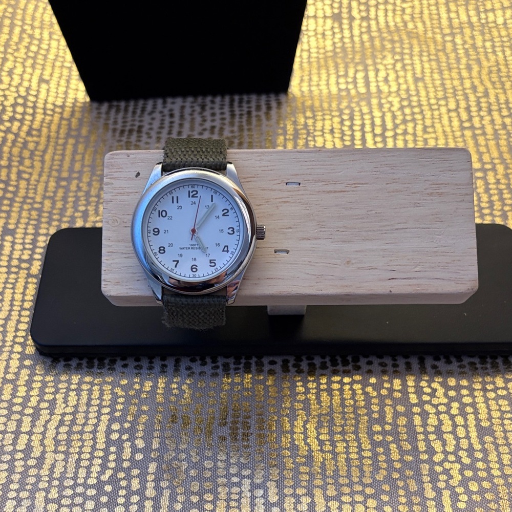 Elegant Silver Watch with Olive Strap